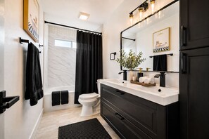 Hair dryer, towels, soap, shampoo