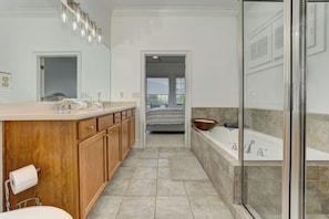Shower, jetted tub, towels