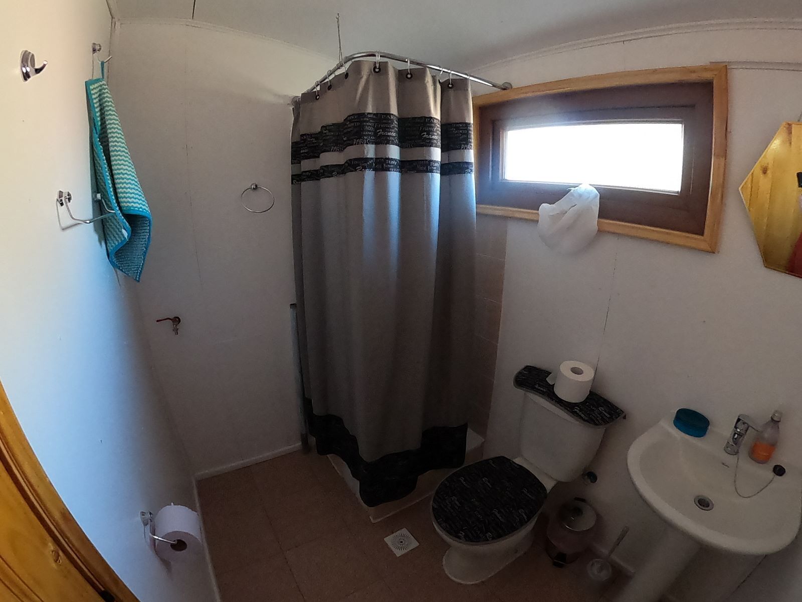 Shower, towels, soap, toilet paper