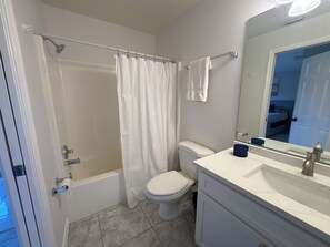 Hair dryer, towels, soap, toilet paper