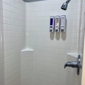 Shower, towels, soap, toilet paper
