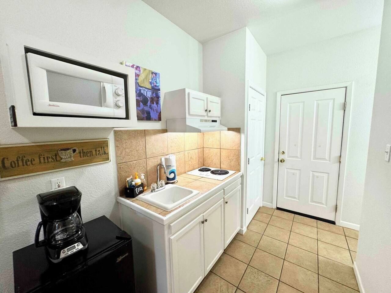 Microwave, stovetop, coffee/tea maker, toaster