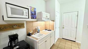Microwave, stovetop, coffee/tea maker, toaster