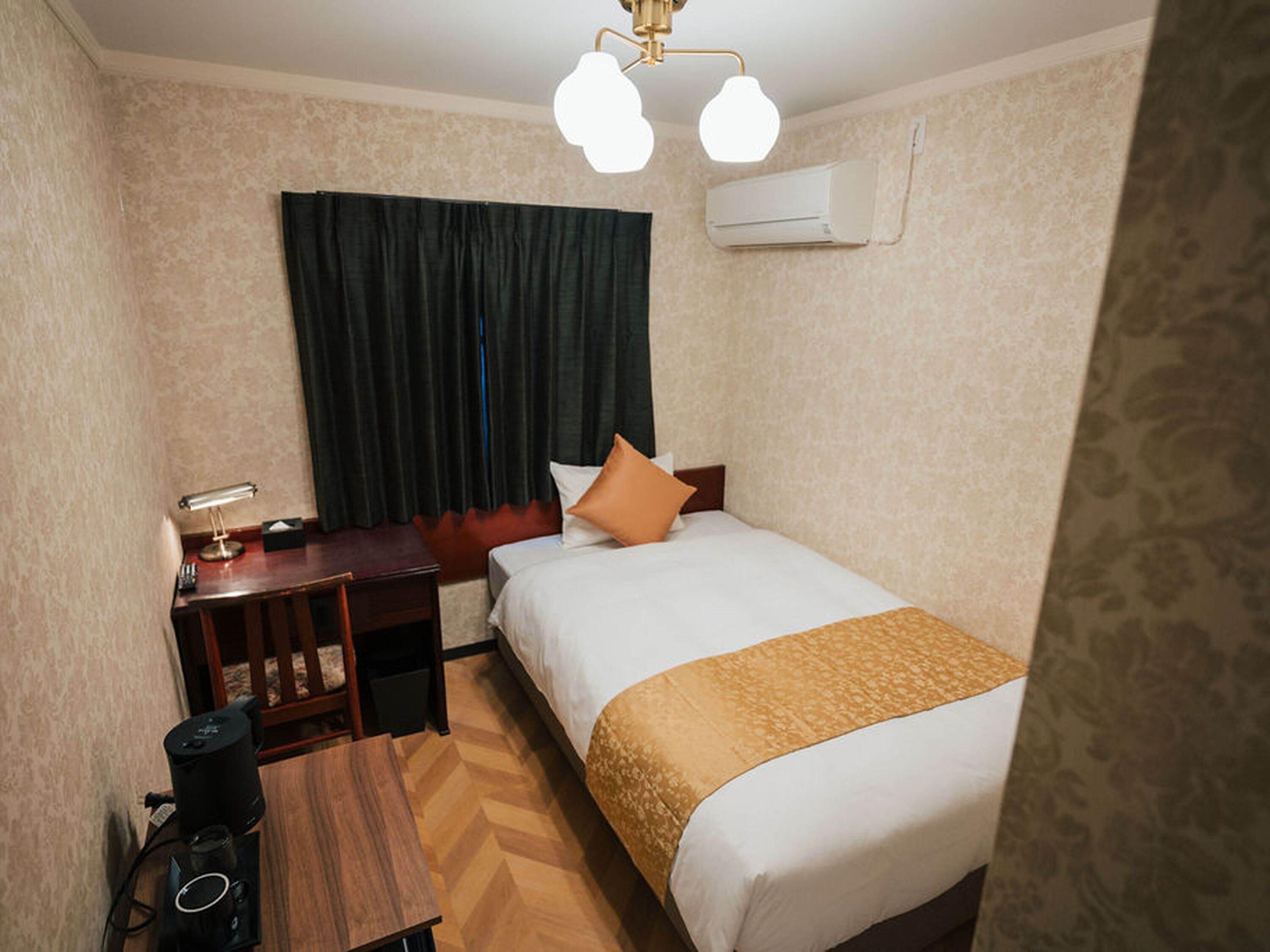 Camera singola, 1 letto singolo, non fumatori, animali non ammessi | Copriletto in piuma, Wi-Fi gratuito, lenzuola