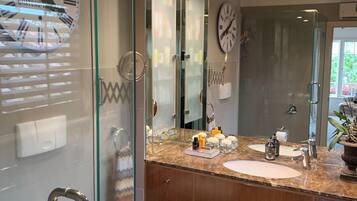 Shower, hair dryer, towels, soap