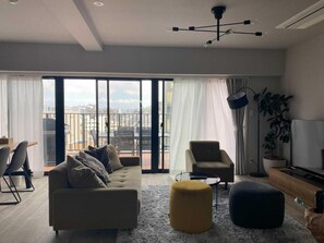 Deluxe Apartment, City View | Living area - THREE (Tokyo)