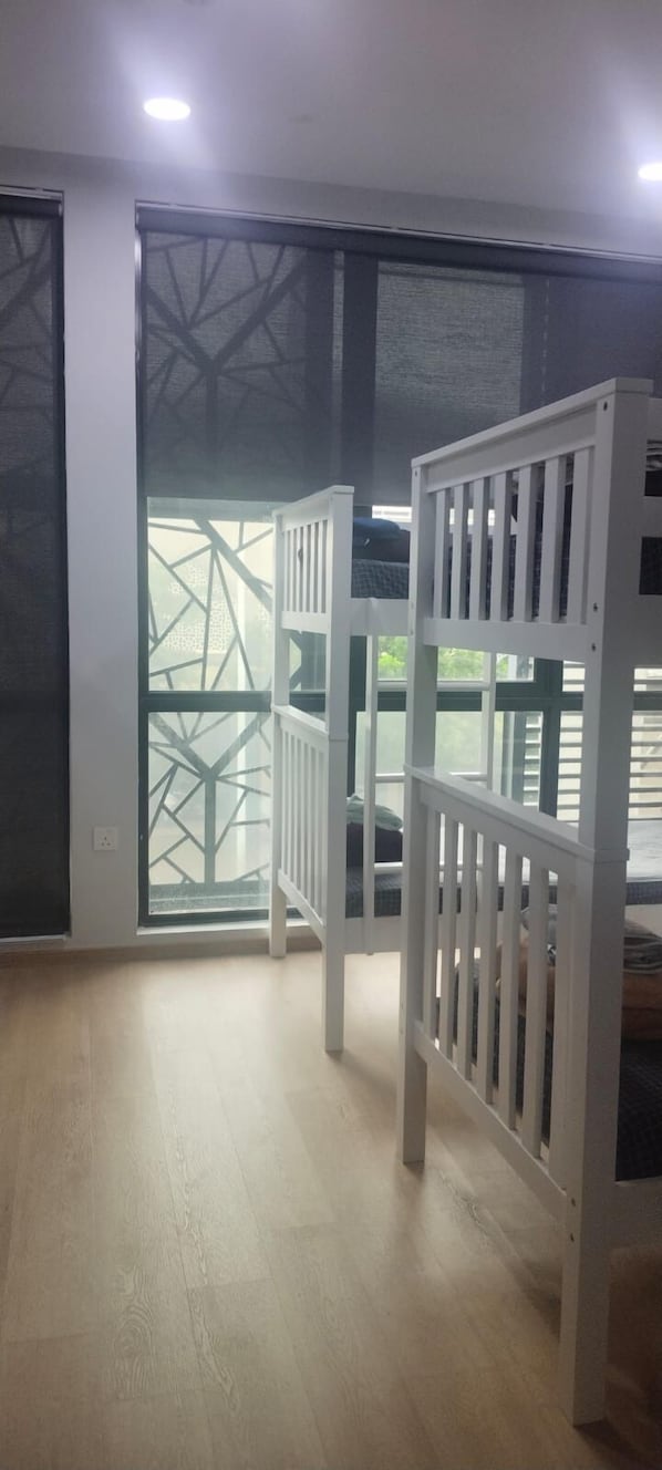 Family Room, City View | Desk, laptop workspace, iron/ironing board, free WiFi - The Family Suites Serviced Apartments (Singapore)