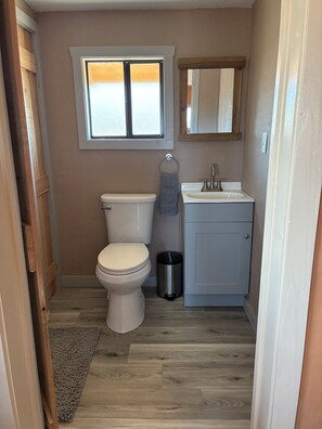 Shower, towels, soap, toilet paper