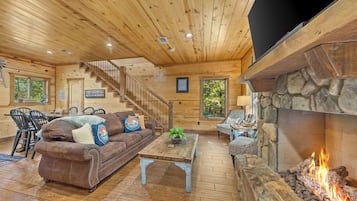 Smart TV, fireplace, foosball, books