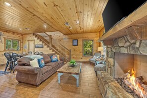 Smart TV, fireplace, table football, books