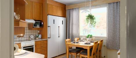 Een koelkast, een microgolfoven, een oven, een kookplaat