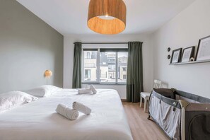 2 bedrooms, travel crib, WiFi, bed sheets