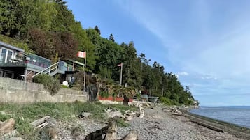 Espreguiçadeiras, toalhas de praia