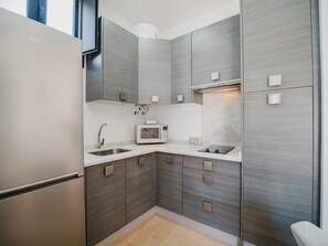 Fridge, microwave, toaster, cookware/dishes/utensils