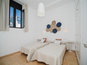 2 quartos, acesso à internet, roupa de cama