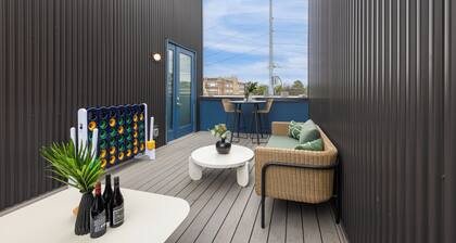 Sleeps 24 | Rooftop, Game Room & Outdoor Spaces | Just 10 Min to Broadway