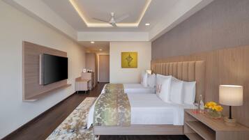Minibar, coffres-forts dans les chambres, bureau