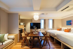 Habitación ejecutiva (Studio Apartment) | Tabla de planchar con plancha, wifi gratis, ropa de cama