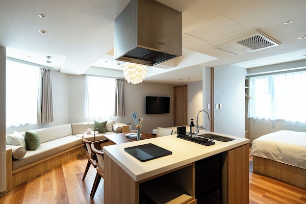 Fridge, microwave, toaster, cleaning supplies