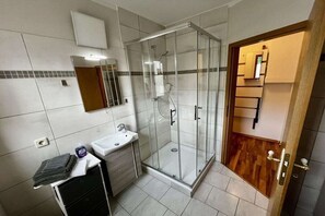 Chuveiro, secador de cabelo