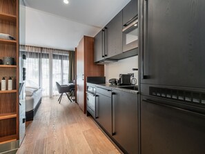 Fridge, microwave, oven, cookware/dishes/utensils