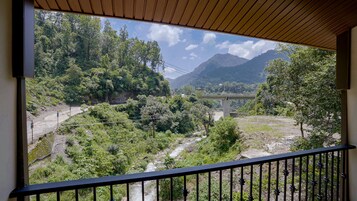 Deluxe Double Room, Balcony | In-room safe, iron/ironing board, free WiFi