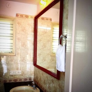 Shower, towels, soap, shampoo