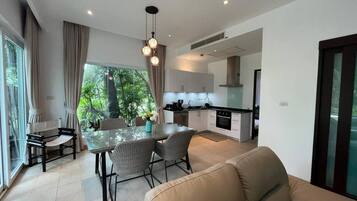 Apartamento familiar, vistas al jardín | Zona de estar