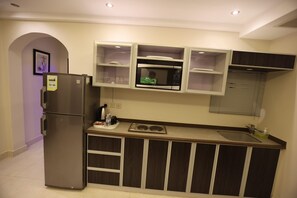 Apartamento conforto, vista para o mar | Área de estar