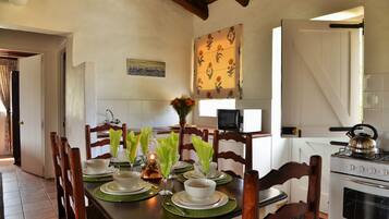 Standard Chalet, Patio, Resort View | Private kitchen | High chair