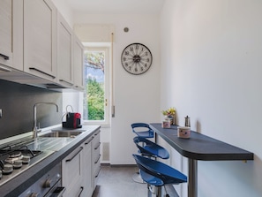 Fridge, oven, cookware/dishes/utensils