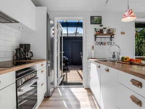 Fridge, microwave, dishwasher, cookware/dishes/utensils