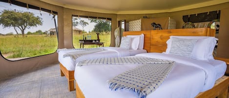 Luxury Tent | Desk, laptop workspace, bed sheets