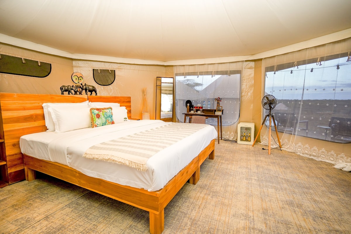 Desk, laptop workspace, bed sheets