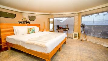 Desk, laptop workspace, bed sheets