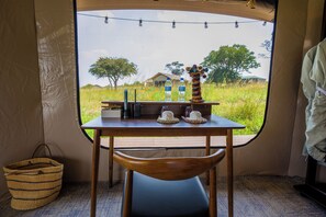 Desk, laptop workspace, bed sheets