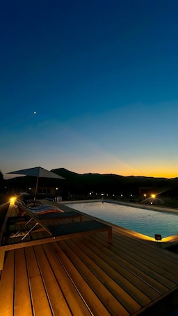 Pool. 'Les Chalets De Tesa' with Mountain View, Wi-Fi, and Air Conditioning