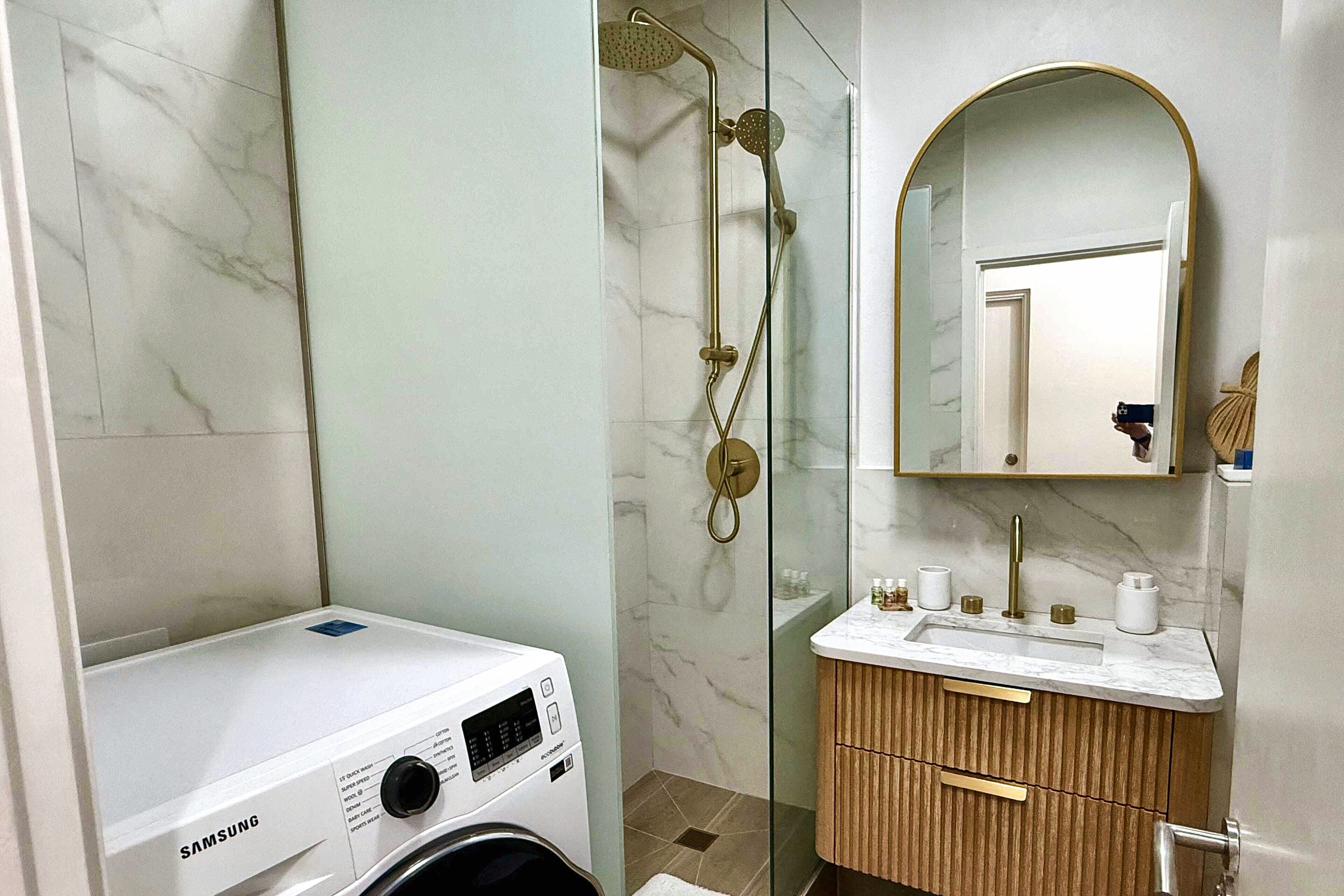 Shower, hair dryer, towels