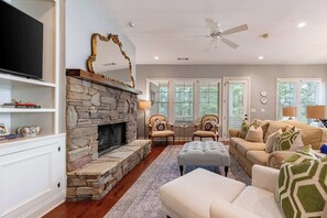 Smart TV, fireplace, books