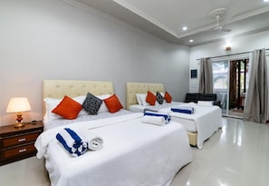 Quadruple Room, Patio, Garden View | Desk, soundproofing, iron/ironing board, free WiFi
