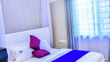 Habitación ejecutiva | Escritorio, espacio para trabajar con laptop y wifi gratis