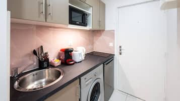 Fridge, microwave, coffee/tea maker, toaster