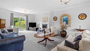 TV, fireplace - Leafield House  - pet friendly near Cheltenham (Little Witcombe)