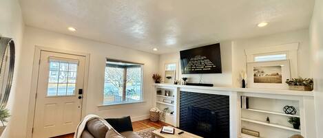 Smart TV, fireplace, books