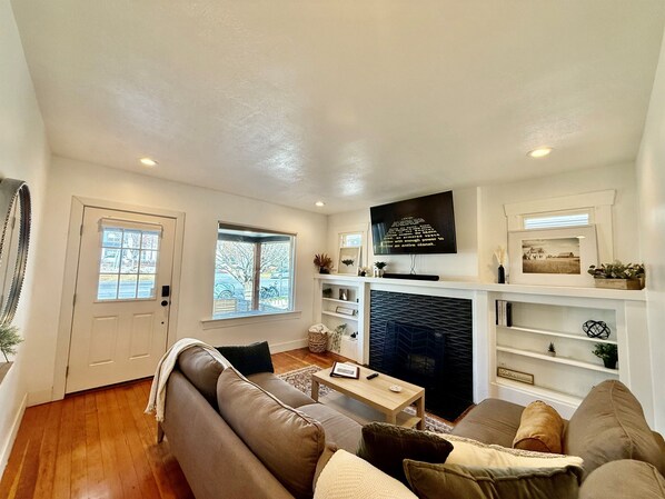 Smart TV, fireplace, books