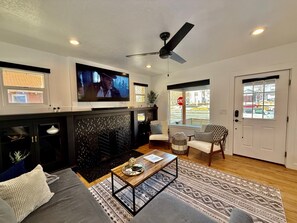 Smart TV, fireplace, books