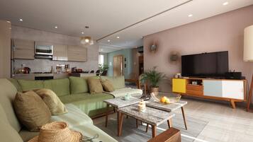 Penthouse, vue océan | Coin séjour