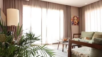 Penthouse, vue océan | Coin séjour