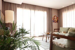 Penthouse, vue océan | Coin séjour