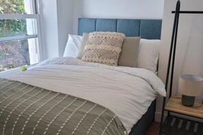 2 dormitorios, tabla de planchar con plancha, wifi gratis y ropa de cama